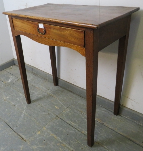 A George III mahogany side table, having one long frieze drawer above shaped apron, on tapering - Image 2 of 3