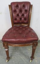 A 19th Century walnut occasional chair, re-upholstered in buttoned burgundy leather with brass