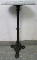 A vintage wine table/plant stand of small proportions, the white marble top on a tapered cast iron