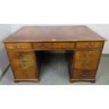 A fine quality Howard & Sons Victorian mahogany partner’s desk, the top with inset brown