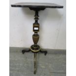 A Regency Period ebonised occasional table, the shaped top with hand-painted central panel amidst