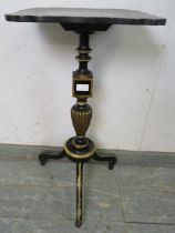 A Regency Period ebonised occasional table, the shaped top with hand-painted central panel amidst