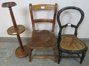 A 19th century elm child’s chair, having removable seat plug, together with a Victorian japanned