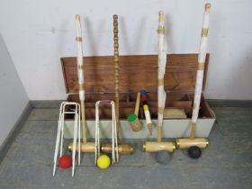 A good quality four player boxed croquet set by Leckford. Box H23cm W116cm D31cm (approx). Condition