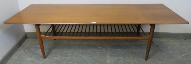 A mid-century teak rectangular coffee table by Kofod Larsen for G-plan, on tapered supports with a