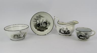 A New Hall bat printed milk jug, sugar bowl, tea cup and saucer, early 19th century. (4 items) Sugar