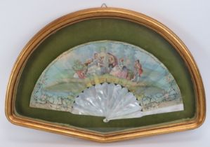 A hand painted mother of pearl fan, probably French, 19th century. Decorated depicting a figural
