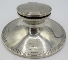 A Capstan silver inkwell with glass liner, Sheffield 1922, Walker & Hall. Approx 5"/13cm across.