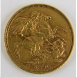 A full gold sovereign, 1896, Queen Victoria veiled head. Gross weight 8.1 grams.