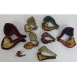 Tobacconalia: A group of eight meerschaum and other clay pipes, 19th / early 20th century.