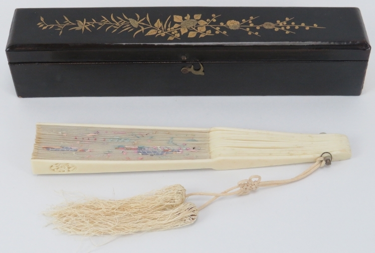 A Chinese silk and carved bone fan, mid 19th century. Embroidered with a dragon amongst clouds in - Image 2 of 4