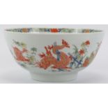 A rare Worcester Kakiemon dragon bowl, mid 18th century. Finely overglaze painted with a