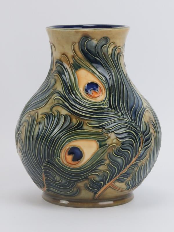 A Moorcroft ‘Phoenix’ pattern vase designed by Rachel Bishop, dated 1997. Tubeline decorated with