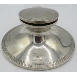 A Capstan silver inkwell with glass liner, Sheffield 1922, Walker & Hall. Approx 5"/13cm across.