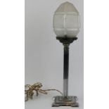 An Art Deco chromed metal and glass table lamp, circa 1920s/30s. With a chrome column and faceted