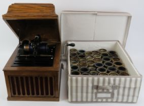 An Edison wax cylinder phonograph player and two boxes of cylinders. (Quantity) Player: 32 cm