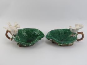 Two Victorian majolica ceramic bowls. Formed as large leaves with blossoming prunus branch handles