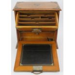 A late Victorian brass mounted oak desktop stationary box. With internal letter rack, draw, pen