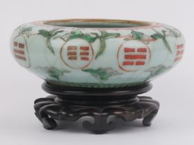 A Chinese crackle glazed celadon porcelain ‘Bagua’ bowl, 19th century. Decorated with cranes amongst