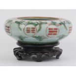 A Chinese crackle glazed celadon porcelain ‘Bagua’ bowl, 19th century. Decorated with cranes amongst