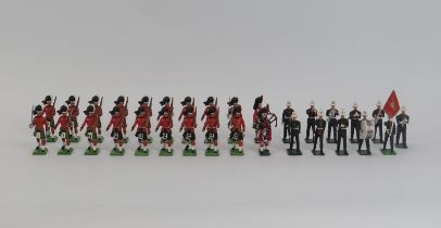 A group of vintage cold painted metal British model soldier figures. Britains Highlander figures
