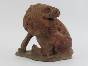 A Chinese terracotta sculpture of a Buddhistic lion, possibly 19th century. Provenance: Purchased