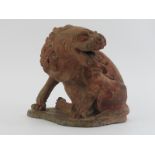 A Chinese terracotta sculpture of a Buddhistic lion, possibly 19th century. Provenance: Purchased