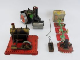 A vintage Mamod steam roller, SE1 stationary steam engine with light bulb generator and polishing