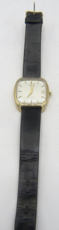 A 9ct gold square faced vintage Longines Ultronic gentleman's wristwatch with black leather strap,