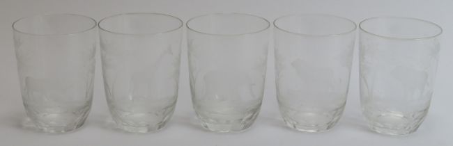 A group of five Rowland Ward ‘Safari’ engraved glass tumblers. Decorated with an elephant, lion,