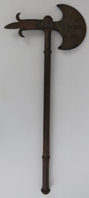 An unusual Indian steel axe with concealed blade, 19th century. The axe head of crescent form