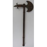 An unusual Indian steel axe with concealed blade, 19th century. The axe head of crescent form