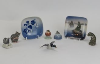 A group of miniature Royal Copenhagen porcelain figurines and two pin trays. Figures included a