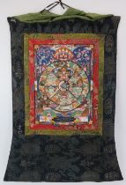 A Tibetan hand painted and embroidered silk Buddhist Mandala wall hanging, 20th century. 85 cm