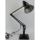 A vintage Herbert Terry black anglepoise lamp, mid 20th century. Base: 15 cm width. Condition