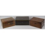 Three Victorian wooden writing boxes. Some miscellaneous contents included as illustrated. (3 items)