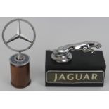 Automobilia: A vintage Jaguar and Mercedes Benz car mascot. (2 items) 14.5 cm height, 11 cm