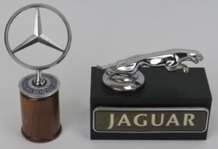 Automobilia: A vintage Jaguar and Mercedes Benz car mascot. (2 items) 14.5 cm height, 11 cm