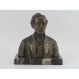 A bronze bust of a gentleman, late 19th/early 20th century. Supported on a marble base of later