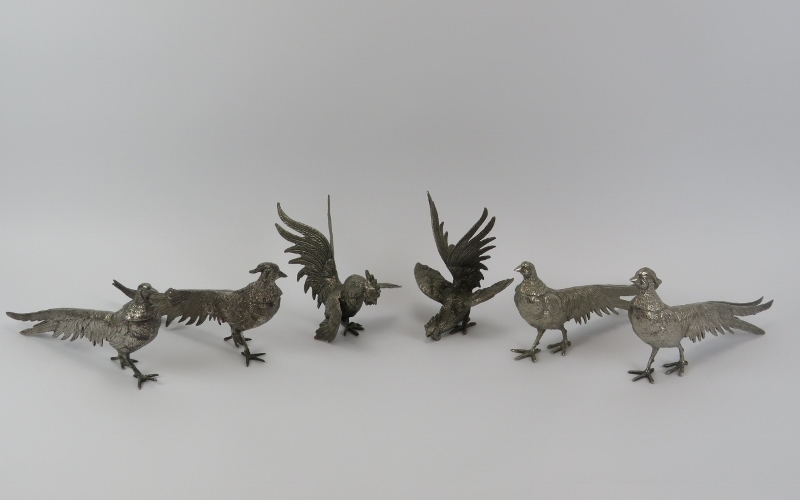 Three pairs of cast white metal cock and hen pheasant table ornaments, 20th century