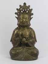 A large Chinese bronze figure of Guanyin, 19th century or earlier. Stylistically similar to Ming