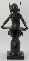 A large French bronze of a fairy reading seated on a marble plinth, 20th century. Signed Charron