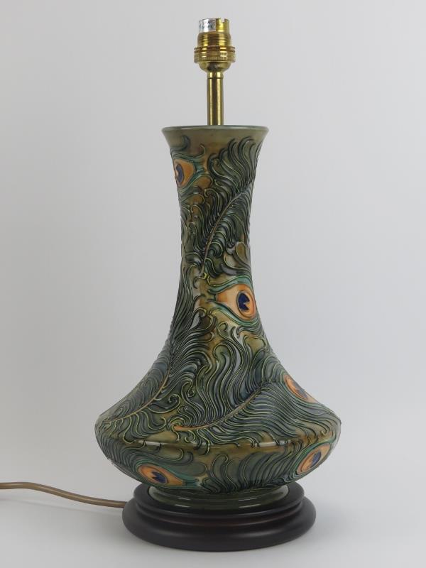 A Moorcroft ‘Phoenix’ pattern table lamp designed by Rachel Bishop, circa 1997. Tubeline decorated