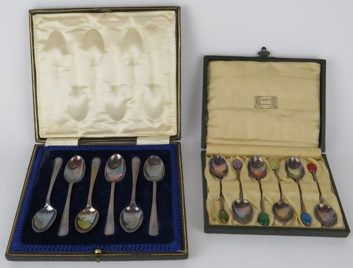 A boxed set of Liberty & Co silver coffee spoons with semi-precious gemstone terminals, hallmarked