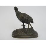 A bronze figure of a partridge, signed F Pautrot. Designed by Ferdinand Pautrot (1832-1874). 11.2 cm