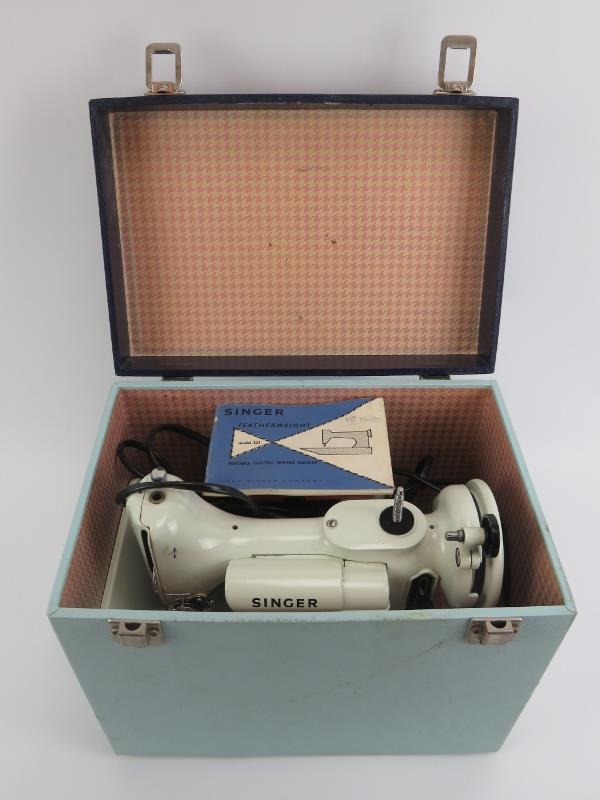 A Singer Featherweight Model 221 portable electric sewing machine. The white Model 221 sewing - Image 3 of 4