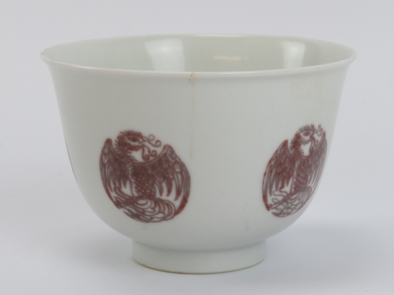 A Chinese underglazed copper red ‘phoenix’ bowl, Kangxi period (1662-1722). The exterior decorated - Image 5 of 6