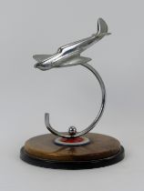Aviation memorabilia: An RAF Spitfire desktop ornament, mid 20th century. Modelled in chrome and