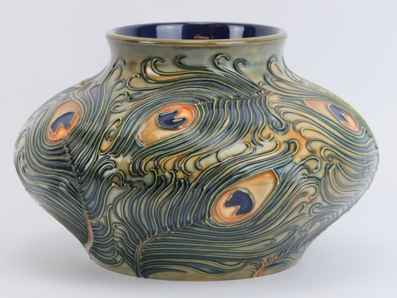 A Moorcroft ‘Phoenix’ pattern vase designed by Rachel Bishop, dated 1997. Of compressed globular