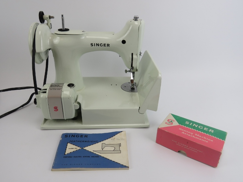 A Singer Featherweight Model 221 portable electric sewing machine. The white Model 221 sewing - Image 2 of 4